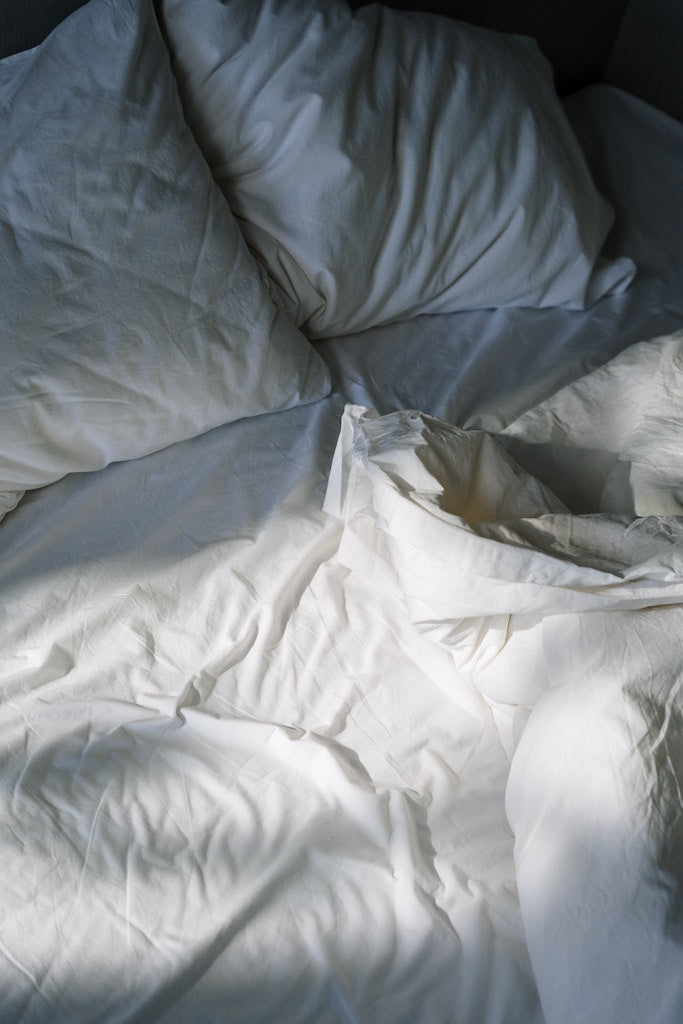 White pillows and bed linen